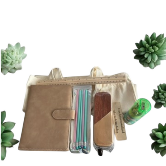 nkhandcraftedgifts personalized teacher gift box with PU leather journal, wooden ruler, pen set, and canvas tote bag.