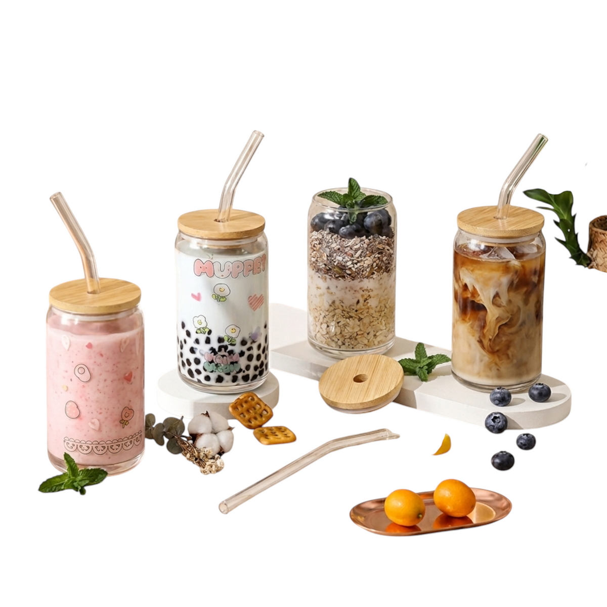 nkhandcraftedgifts personalized Libbey can-shaped glass cups with bamboo lids and glass straws filled with drinks