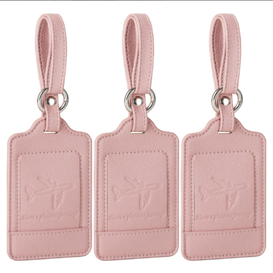 nkhandcraftedgifts set of three pink PU leather luggage tags with airplane embossing and privacy flap