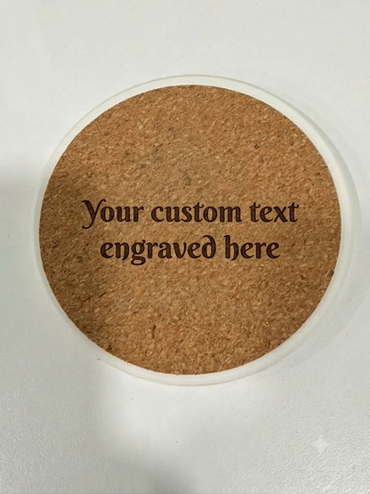 Laser engraved custom message on cork backing of round ceramic coaster